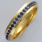 Обручальное кольцо из золота 585 пробы с рубинами